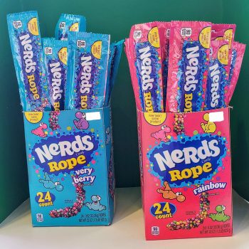 Blue and pink Nerds ropes in boxes.